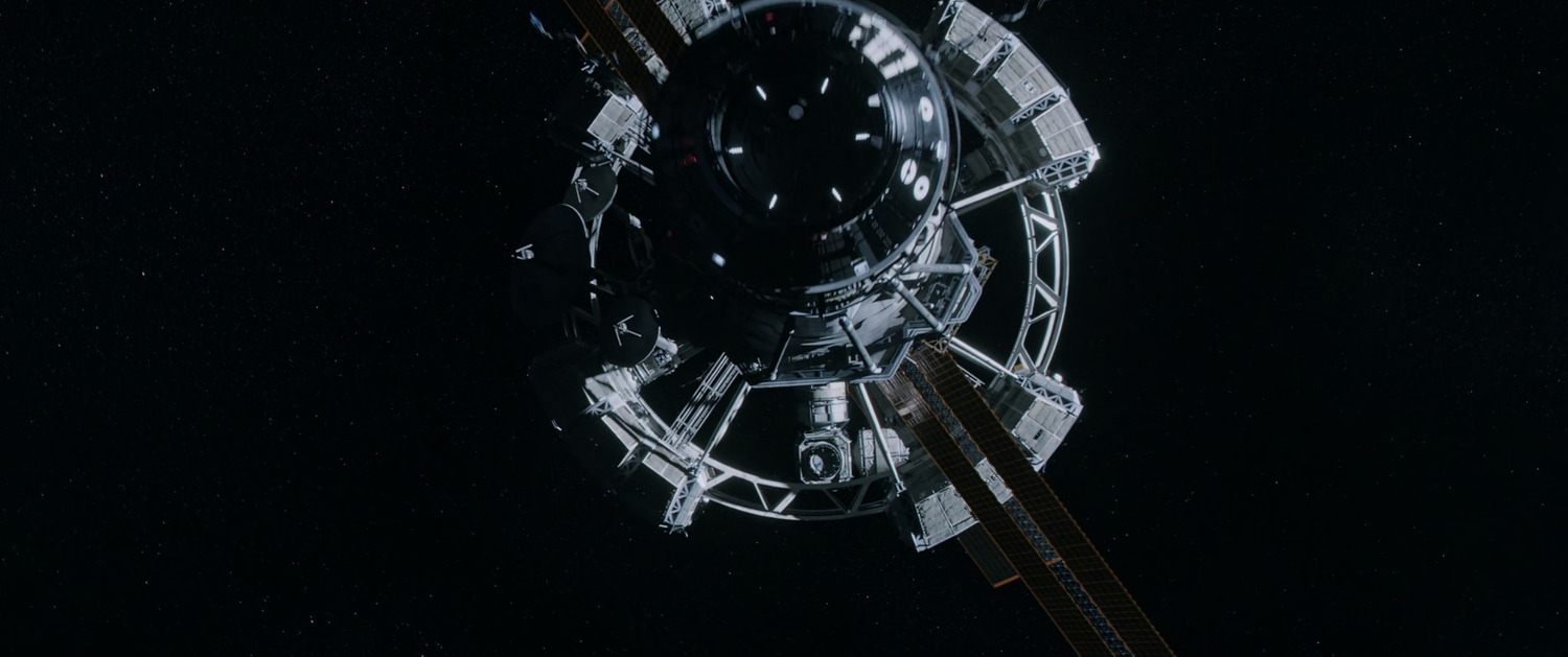 A still from The Martian showing space depicted as dark and largely starless.